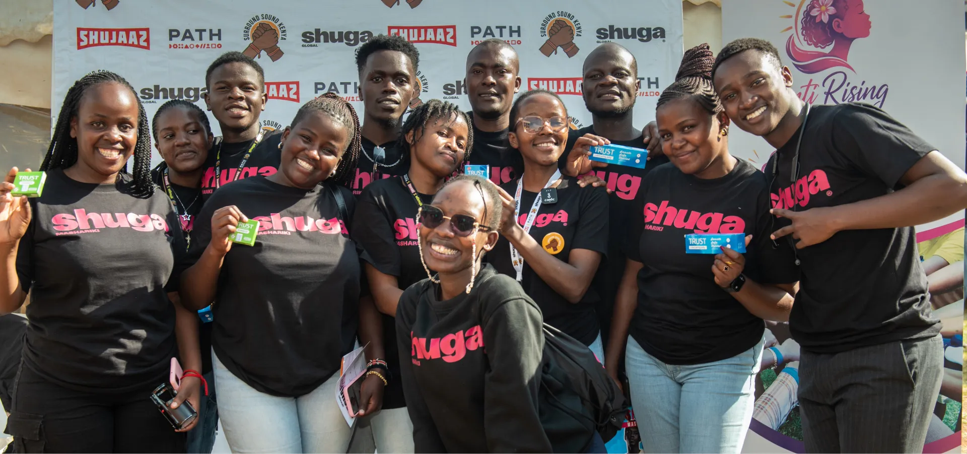 Young men talking into a Shujaaz microphone